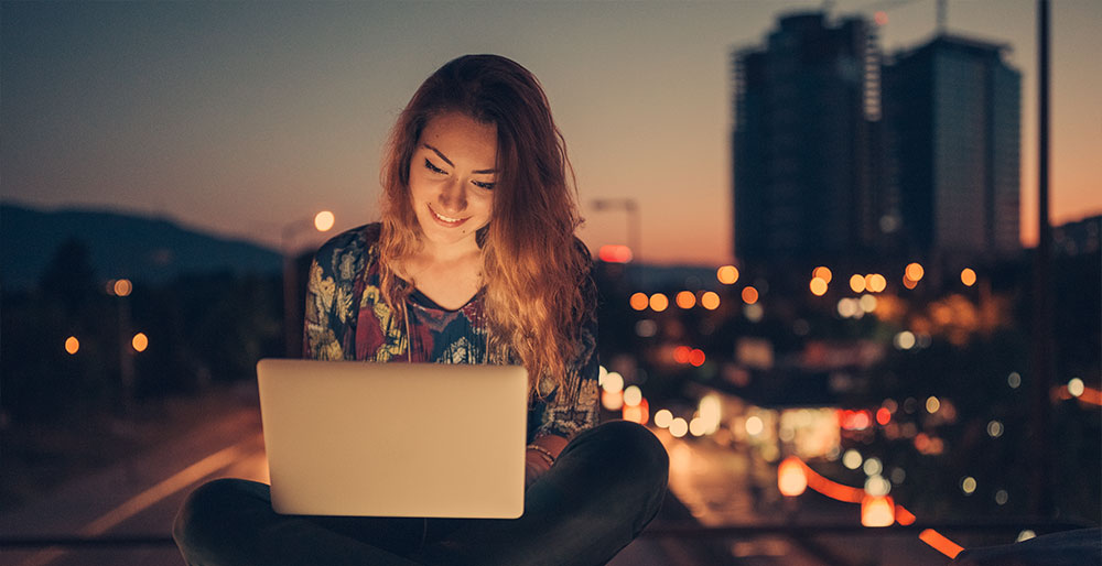 Happy Girl taking a test online